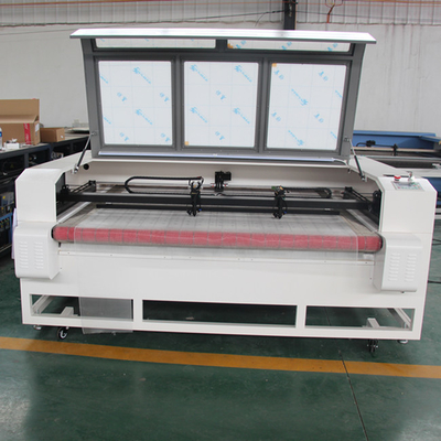 Taglio di cuoio 1610 del tessuto della tagliatrice dell'incisione laser di CNC con il sistema d'alimentazione automatico doppie teste